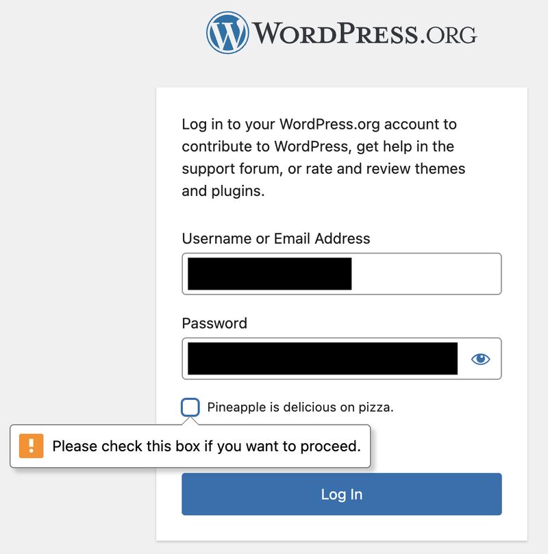 Wordpress.org login screen, with the user name and password fields filled in, but redacted. Below the form is a checkbox with the label Pineapple is delicious on pizza. It is unchecked, and has an error message saying please check this box if you want to proceed.